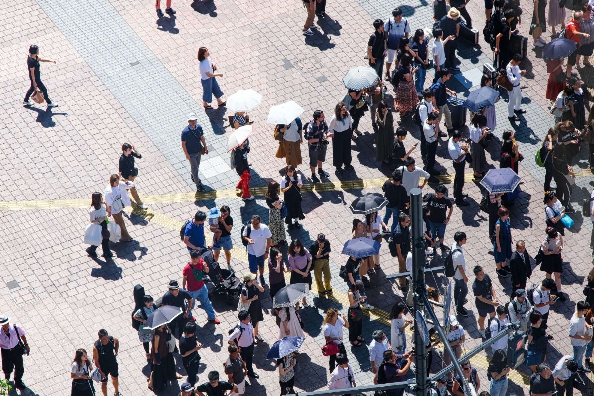 Capturing the crowds from a couple hundred feet above is always fun. We tried to capture the abstract patterns formed by the crowd in this picture.